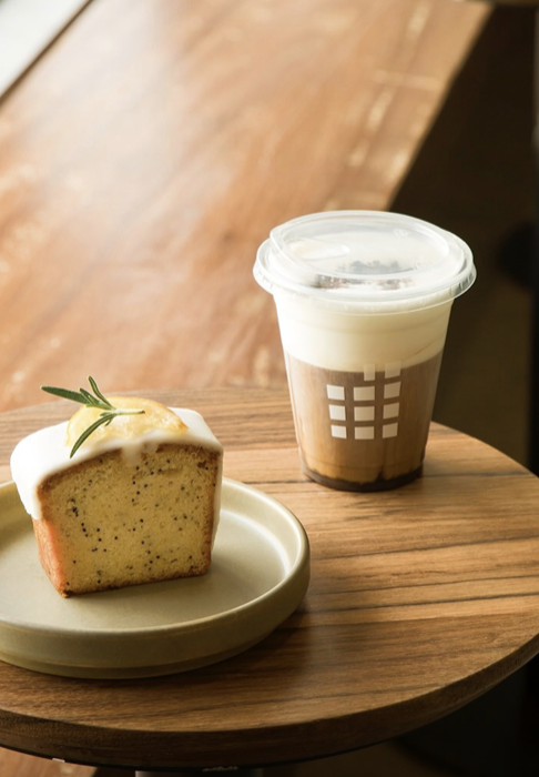 Lemon poppy seed loaf slice and iced coffee
